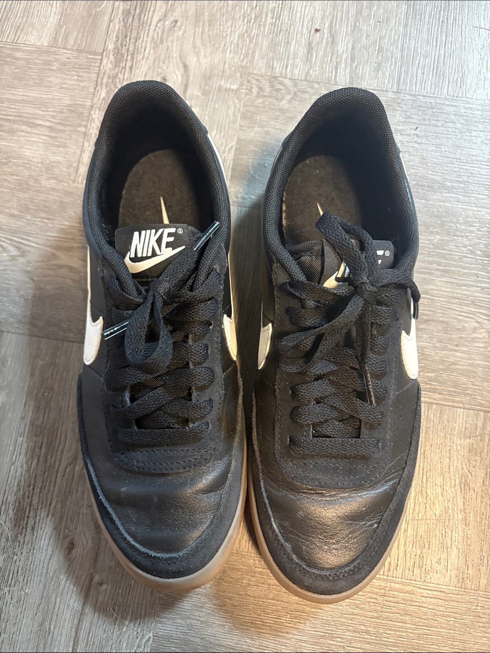 Nike Women’s Black Sneakers with White Swoosh